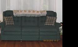 Couch and recliner purchased new in 1996 - rarely used. Color is forest green with a small red and cream color pattern. Also comes with 2 matching double sided pillows. One side of pillow has same pattern as the couch and recliner; opposite side is green
