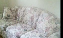 FLORAL PRINT SOFABED IN EXCELLENT CONDITION