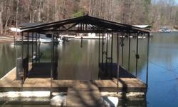 22' covered boat dock with swim area. On lake Lanier will move to location on same lake.
