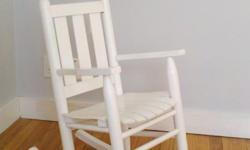Crate and Barrell child's white rocking chair.