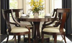 Item Description
This beautiful pedestal dining table and chair set will be a lovely addition to your semi-formal dining room. The smooth round table top features a smooth edge, in a warm rich Cherry finish over exotic Catalpa wood veneers. The simple and