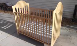 Fisher Price oak wood crib for sale.&nbsp; Used for one child.&nbsp; Need to sell ASAP.&nbsp; Text or call if interested.