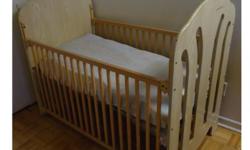 Wooden Crib (without mattress)...with adjustable height.....size Length (4 feet) X Width (2 feet)......good condition...easy to assemble/disassemble...Comes from a clean home, no pets, non-smoking.....plz email or call 6473428774