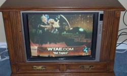 Older Crosley 24" Console Color TV - Walnut cabinet in good condition.
Cable ready, in good working condition. Pick up only.