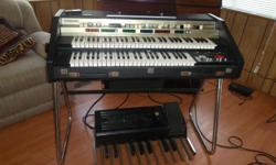 I HAVE A CRUMER PORTABLE ORGAN WITH FOOT PEDALS AND STAND
(THIS IS A COLLECTORS ITEM) THIS ORGAN SOUNDS LIKE A HAMMOND PORT-B
AND SOUNDS GOOD AND IS IN GOOD SHAPE. IT ALSO HAS 2 KEYBOARDS
FOR MORE INFO ()-