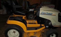 Cub Cadet garden tractor series 2500 model GT2542.&nbsp; Includes 42" mower deck, 42" auger style snowblower, tire chains and rear counterweight, front blade attachment, large rear mount double bagger.&nbsp; Purchased 7/08, full service done a month ago