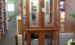 Nice Curio Cabinet,one glass from door missing,light,
$ 75 neg.