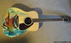 2012 Yamaha FG730S guitar. This guitar is mint condition, has been played very little and has a great sound. Custom painted by Carlos Montoya. Don't miss this fantastic deal.&nbsp;