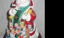 Santa Claws Figure by Danbury Mint
Approximately 9 inches high
In great condition and displayed in a non-smoking home.
Comes with Certificate of Authenticity and Certificate of Registration. Both have staple marks in the upper left corner.
Serial # A1909