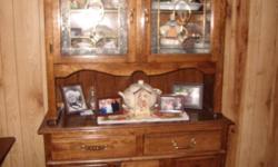 TABLE WITH LEAF AND 4 CHAIRS. HUTCH TO MATCH.
NICE SHAPE.
$1900.00 NEW--ASKING $800.00 FIRM