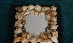 DECORATIVE SEA SHELL MIRROR WALL HANGING, MEASURES: 20X20",,...SHIPPING AVALIABLE.....