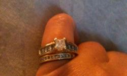 1.5 ct diamond engagement ring (.75 princess cut solitaire) and .5 ct wedding bad.....GORGEOUS!!! paid $5500
