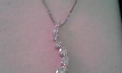 Diamond Journey Necklace w/18" Chain (white gold)
Seven diamonds add up to almost 1karat
Excellent Condition - Never Worn
Purchased at Kay Jewelers - In original box
Receipt available - best offer