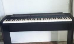 A digital piano with stand in good cond $150 or obo