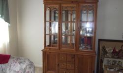 &nbsp;Breakfront (China Closet)&nbsp; . Excellent condition. Breakfront has lights built into unit.&nbsp; Asking $200.00
Call ()-