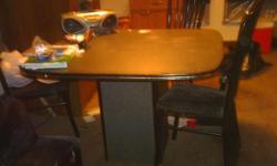 black , gold, and grey pedestal table with four chairs .......good condition........you will need to pick up