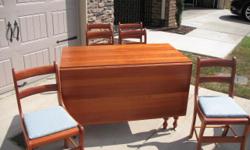This is a solid cherry dinning table with 2 drop leafs. 6 Chairs to match. Great Conditions
