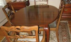Dinning Room table, solid cherry MFG BEAL, has two leaves with six chairs. Hutch has lights inside.