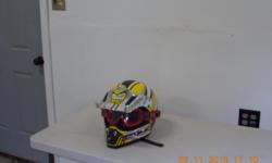 Yellow with stripes, visor, gogles, filter. Helmet is in great shape not use much. Run 150.00+ for helmet.