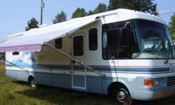 Class A Dolphin Motor Home,33, foot ,1998,Ford 460 cid V 8, gas engine, .&nbsp;48,000 miles, main room slide out, sleeps 4, leveling jacks, awning,convection Microwave,T.V. DVD,&nbsp;2 A/C units, good tires tires,550k generac genarator&nbsp;loaded,