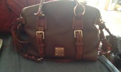 Dooney and Bourke purse.&nbsp; Original price $550. &nbsp; Selling for $200.00. Brown with accents.&nbsp; Please place best offer!&nbsp; Thank you!&nbsp;
&nbsp;