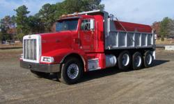 1996 377 pete tri axle 44,000 rears 433 ratio, 10 speed, 20,000 front, 16ft davis bed 80% rubber