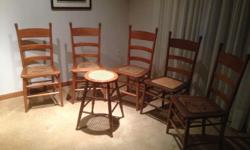 5 wooden ladder back chairs and 1 stool.