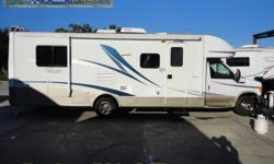 With only 21K on the ODO this great 2004 Trail Lite B+ RV is ready to hit the road to fun and adventure! With sleeping for up to four you family will rest in comfort while you are seeing the world! Built on a Ford R-450 van chassis it is as easy to drive
