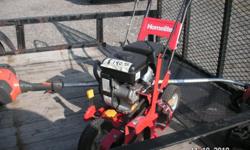 Homelite Edger, has a 79cc motor it is a three wheel edger, like new used 3 times this summer. Has a 9 " blade.