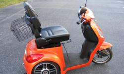 electric scooter,like new, low miles, 48 v, max velocity 30 km/h, max distance on single charge: 43 km. security belt, arm rest, turning lights, stop lights, back/forth switch
charger included, capable of towing a bycicle trailer up to 80 pounds. a team