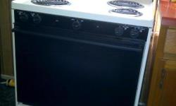 4 burner electric stove, with a drawer in the bottom underneath the oven.&nbsp; Hasn't been used very little.