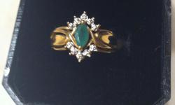 emerald marquis 14C gold ring with diamond around emerald&nbsp; will txt pic if interested 513-600-3329