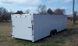 Enclosed cargo trailer 28' long.&nbsp; Auto ramp and side door