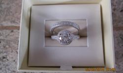 Sterling silver 2 piece zirconia diamond ring's with cubic zirconia diamonds retail $670 i buy in bulk you pay $80 size 6 1/2 brand new in box selling 8am - 8pm no shipping cash only.