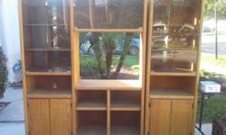 Wood Entertainment Center, 2 pieces....excellent condition!!!! Adjustable shelves and lights. Wood maintenance kit included. 81"L x 71" H x 17" D TV Area 31" L x 25" H x 17" D