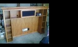 2 pc. OAK ENTERTAINMENT CENTER/WALL UNIT (TOP-6'H X 6'10"L) (BOTTOM-22"H X 8'L X 2 ' 5"D) FITS 52" FLAT SCREEN TV. PURCHASED FROM CLOSED SHOWROOM @ WORLD MARKET CENTER, RETAILS FOR $1800.00 PLUS. EXCELLENT CONDITION, NEVER USED, SMOKE FREE ENVIRONMENT.