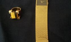 Fabulous watch 18K Gold men's formal, Chhopard Geneve, Tiger Eye face with matching Ring.
Recent $600. clean/polish - Full documentation & insurable. &nbsp;Approximate replacement cost @ $25K-$30K.
High End & Rare. &nbsp;Great Investment, $6,500. OBO.