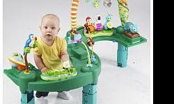 Evenflo ExerSaucer Triple Fun Jungle
Review from Babies R us site:
?My almost 4 month old LOVES it! Ever since my son was born, he preferred to be in the sitting up position. He's now almost 4 months old, and has very strong head & neck control. We bought