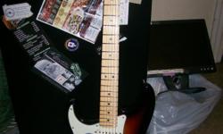 Fender American Deluxe Strat Ash Left Hand Maple Tobacco Sunburst,Fender Hard Case included,never played an has all org. paperwork from the factory,I will take $800.00 cash "local pick up only"