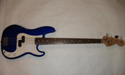 2005 Fender Squier P-Bass 4 string electric bass guitar in excellent+ condition
--solid alder body in metallic blue finish
--maple neck w/ rosewood fretboard
--chrome hardware and tuners
This Precision bass is in really nice shape as it has lived its