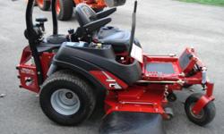 This mower has been used only 98 hrs. and is in like new condition. It has the following features:
. ENGINE: 21hp Kawasaki - V-Twin
. Two stage industrial air-cleaner.
. Rugged 6- gallon gas tank.
. Fans mounted on top of hydro pumps.
. Easy access oil