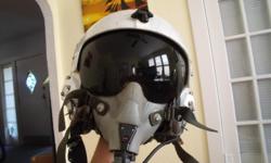 Selling Gentex HGU-33P. This is a helmet worn by fixed wing aviators around the years of the Vietnam conflict. Comes with mask, mounts, and OD green helmet bag.