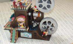 Beautiful Collectible "Film Reel / Picture Show" Figurine!
Exclusive detail, featuring authentic cut, charming personality in illuminated 3D.
"Three Little Pigs Theme"