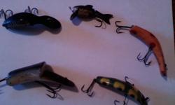 top to bottom left to right in picture 1,Heddon Tadpolly Spook,2 Garcia Plucky ,3 Kautzky Lazy Ike,4 Helin Flatfish and 5 Kautzky Top Ike. Going to put on Ebay but thought I would try here first thanks