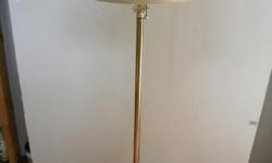 I HAVE READ MANY A BOOK BY THIS LAMP WHICH SET BESIDE MY RECLINER. IT TAKES TWO BULBS WITH SWITCHES FOR EACH. LAMP IS 58" HIGH. BRASS BASE NEEDS CLEANING.