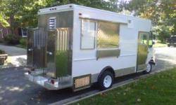 The vehicle being offered for sale is in excellent condition. It is a 2001 Grumman Olson Ford Step Van Custom Mobile Kitchen (V.I.N. 1FCJE39L8YHA60965). The current odometer reading is 158,929 miles. The engine is a Ford 5.4L V8 that runs on regular
