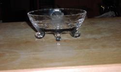 Pretty little footed glass nut/candy dish with etched floral pattern. Also has cut glass design of stems and leaves. Beautiful and in fantastic condition, with no chips or cracks.