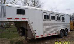 1999 4 Horse slant- Horse Trailer
Aluminum- White skin
Dressing Room
Knotty Pine Lined- with Black Horse shoe hooks, Mattress, Insulated, Electrical outlooks, Tile floor,
2 windows, Saddle Rack for 4 saddles, can be securied in the dressing room or in the