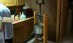 Wine making equipment--Large fruit press-large fruit crusher-9 oak kegs with rack for all--bottling and testing equipment--11 5/6 gallon carboys--large musting barrel - air locks- racks for about 300 wine bottles lay on side--many champagne bottles would
