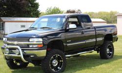 BEAUTIFUL BLACK ON BLACK 2000 SILVERADO LT Z71 EXT. CAB WITH 3RD DOOR. FULLY LOADED ALL OPTIONS. POWER EVERYTHING. LEATHER/POWER BUCKET SEATS.